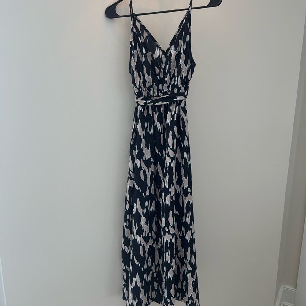 Never-worn spaghetti strap maxi dress with black and tan organic print.